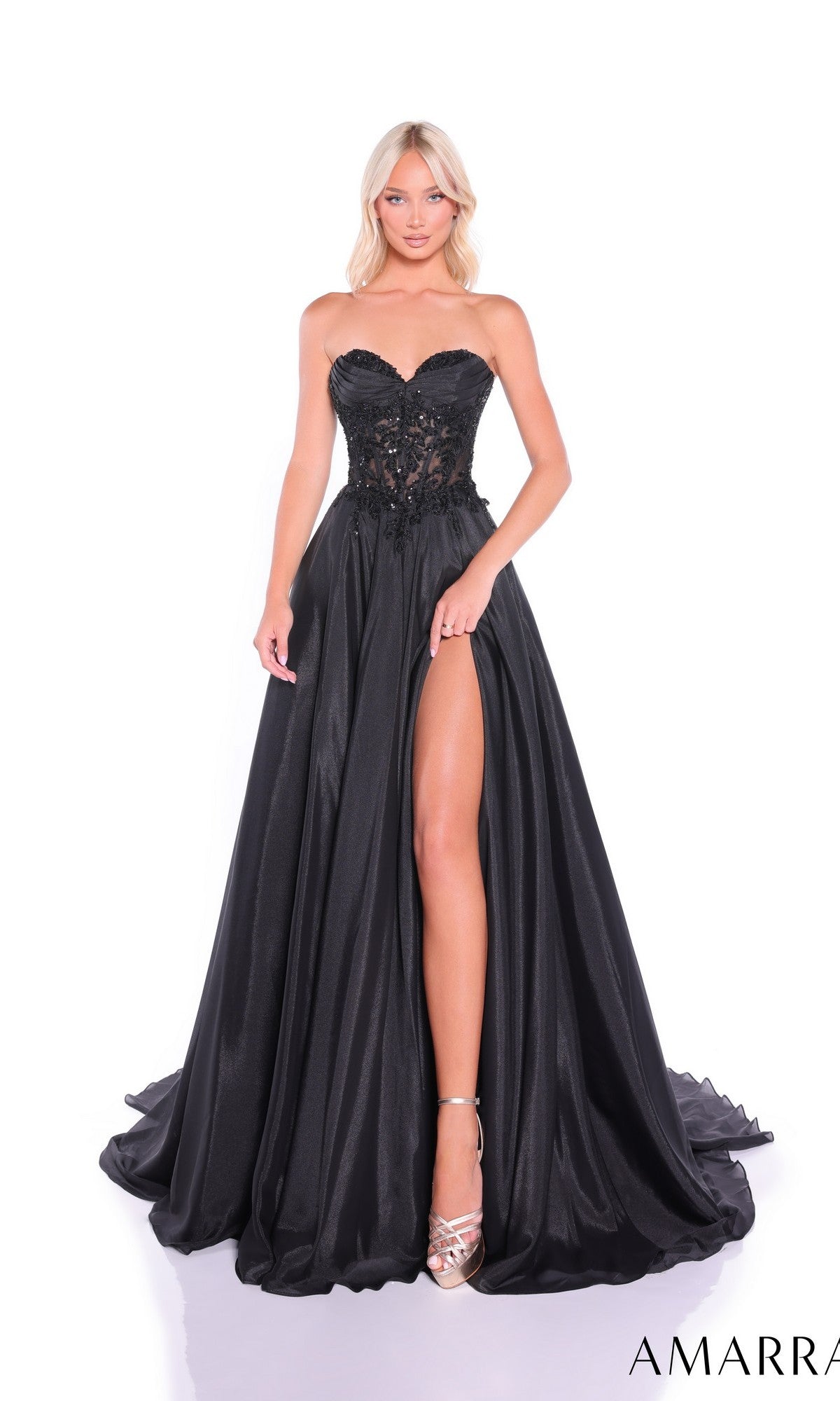 A woman in the Amarra 89315 long prom dress, featuring a strapless hot-stone embellished bodice and a high-slit chiffon A-line skirt, stands against a white background.